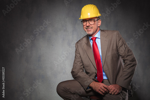 confident senior engineer wearing helmet and glasses, smiling © Viorel Sima