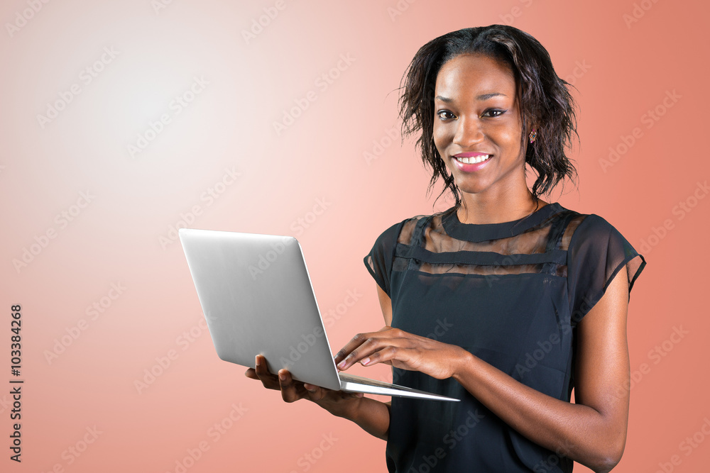 Portrait of confident young african woman using laptop Portrait of confident young african woman using laptop