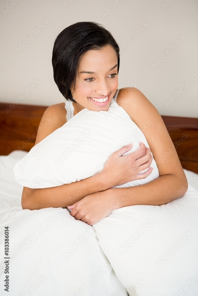 Attractive brunette on bed Attractive brunette on bed