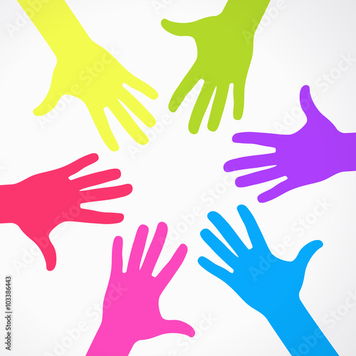 Conceptual circle of colorful hand prints