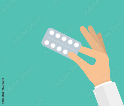 Hand holding medicine pills in blister pack. Vector illustration in flat style