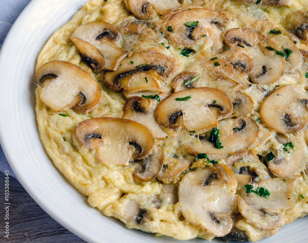 Delicious omelet with mushrooms and tomatoes Delicious omelet with mushrooms and tomatoes