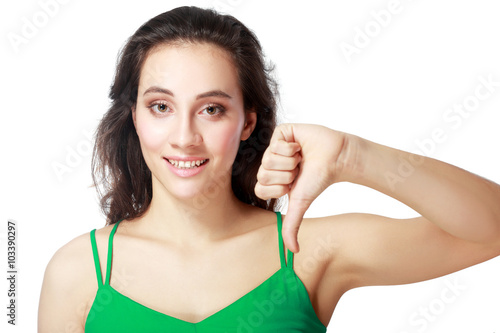 woman showing thumbs down photo