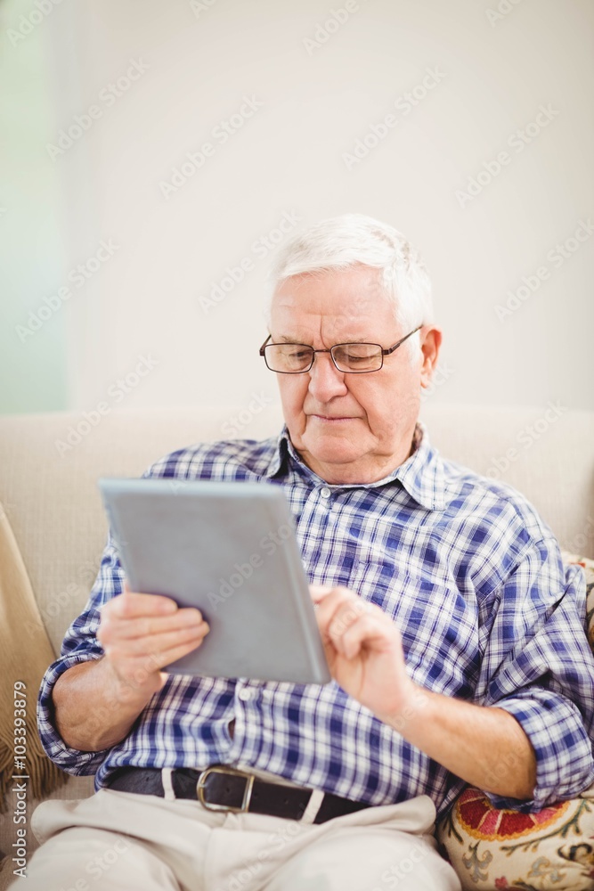 Senior man using digital tablet Senior man using digital tablet