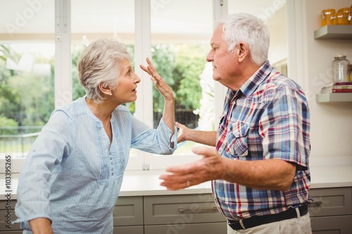 Foto Senior couple arguing with each other