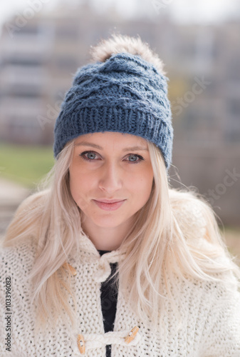 portrait of blond girl in winter clothes