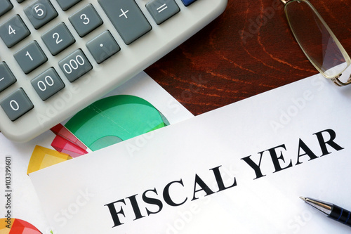 Paper with Fiscal year and charts.
