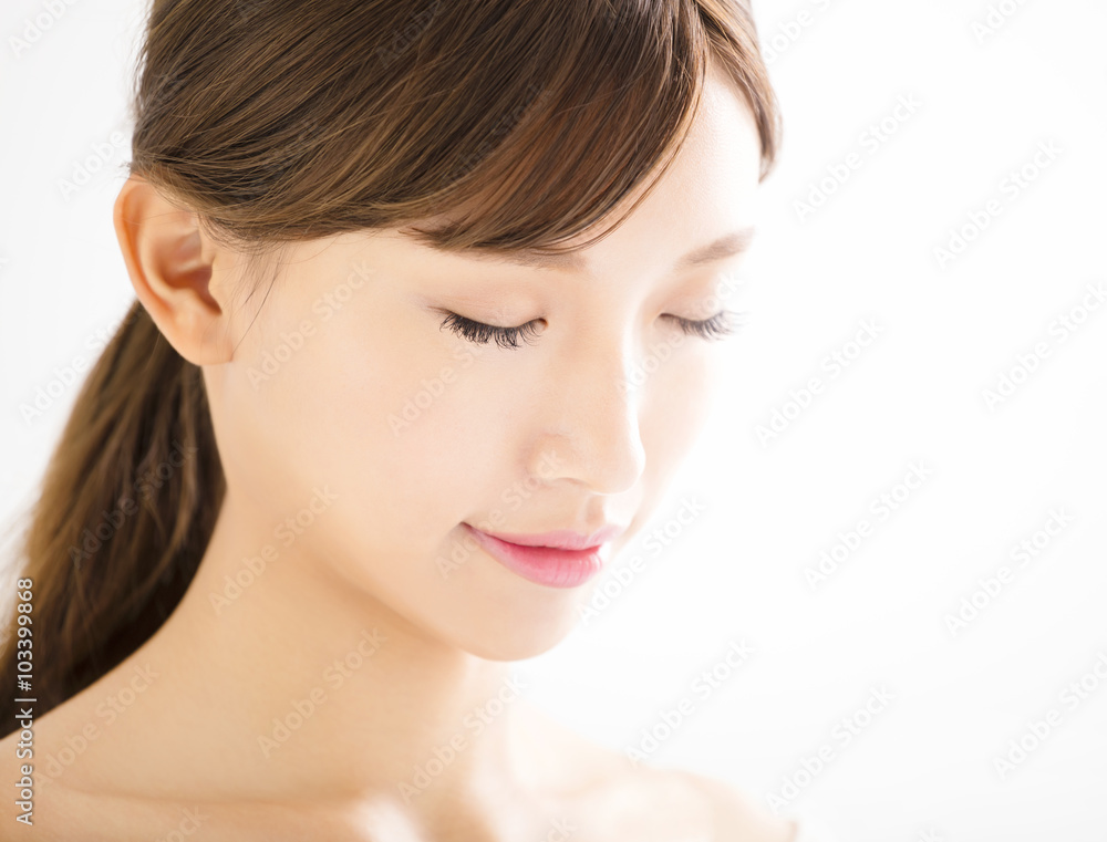 closeup beautiful young woman face closeup beautiful young woman face