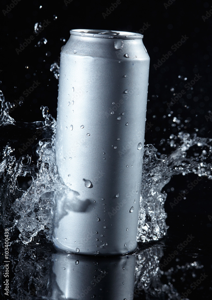 beer can with water splashes beer can with water splashes