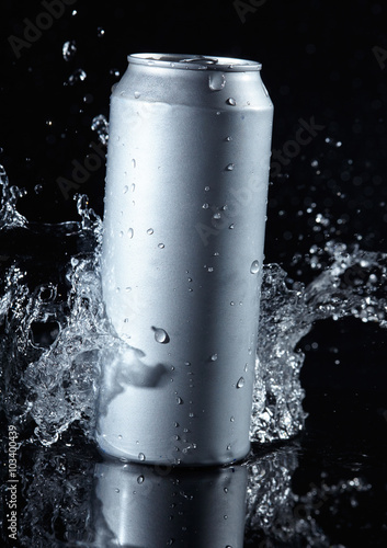 beer can with water splashes