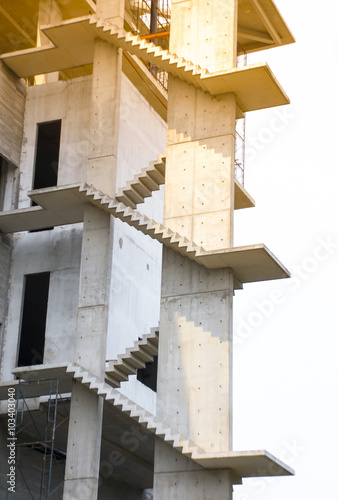 The stair of building construction with sun light
