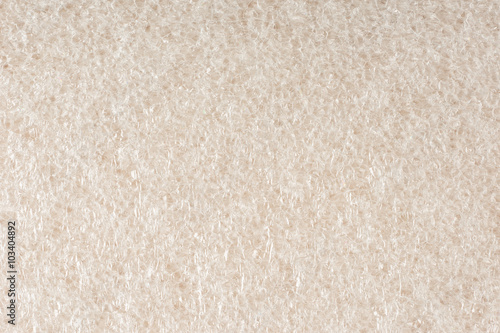 Foam plastic macro texture, like tiny soap bubbles pattern. White background