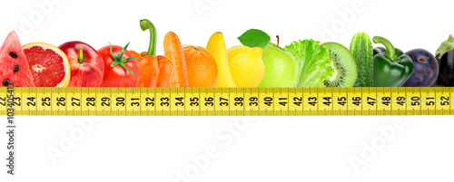 Fresh fruit and vegetable with measuring tape