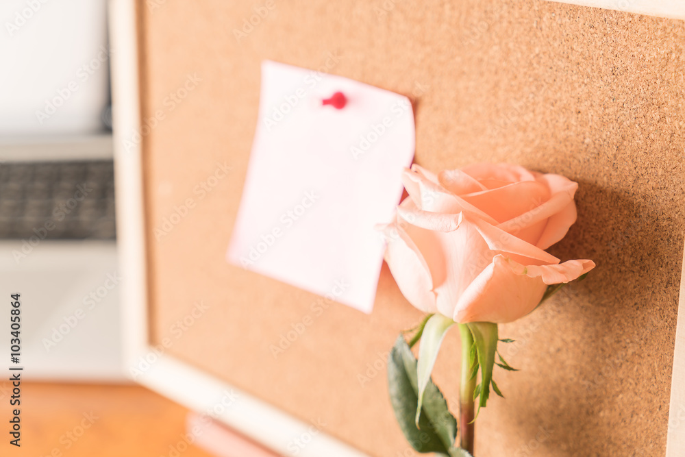 rose with paper note