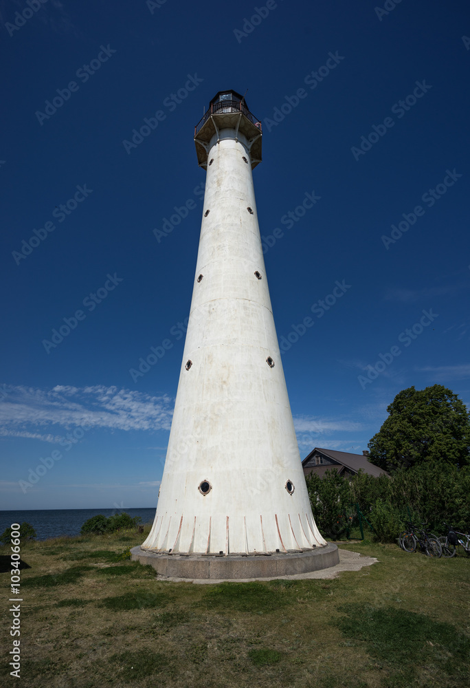 Old lighthouse in the summer. Kihnu, small island in Estonia. Europe