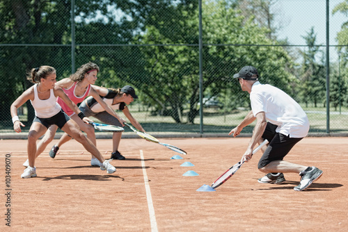 Billede på lærred Touching markers, cardio tennis fitness class