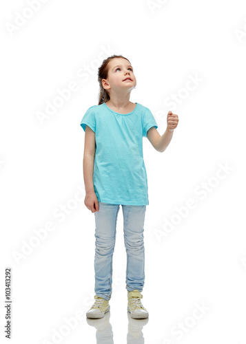 girl looking up and holding something invisible