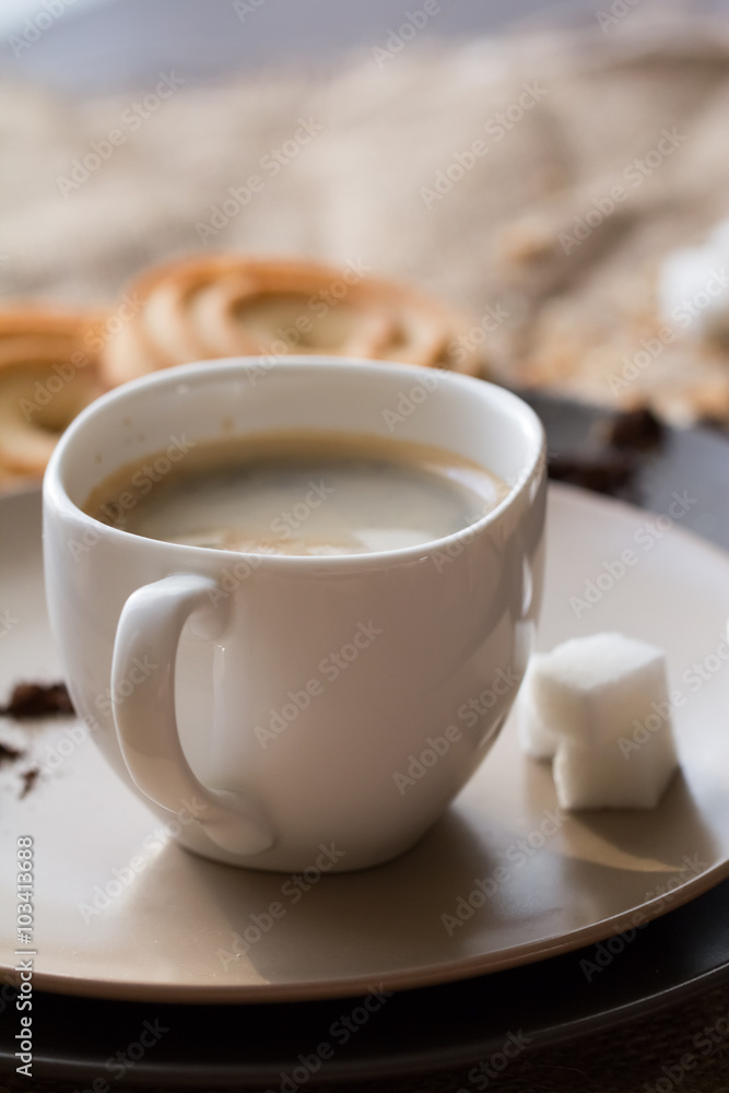 cup of hot espresso coffee, and cookie cup of hot espresso coffee, and cookie