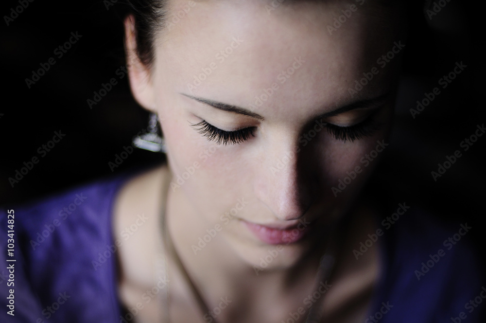 Close up macro white girl portrait with long lashes from the front Close up macro white girl portrait with long lashes from the front