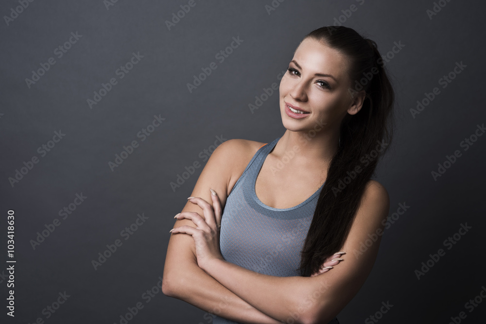 Sporty woman on the dark backgroud Sporty woman on the dark backgroud