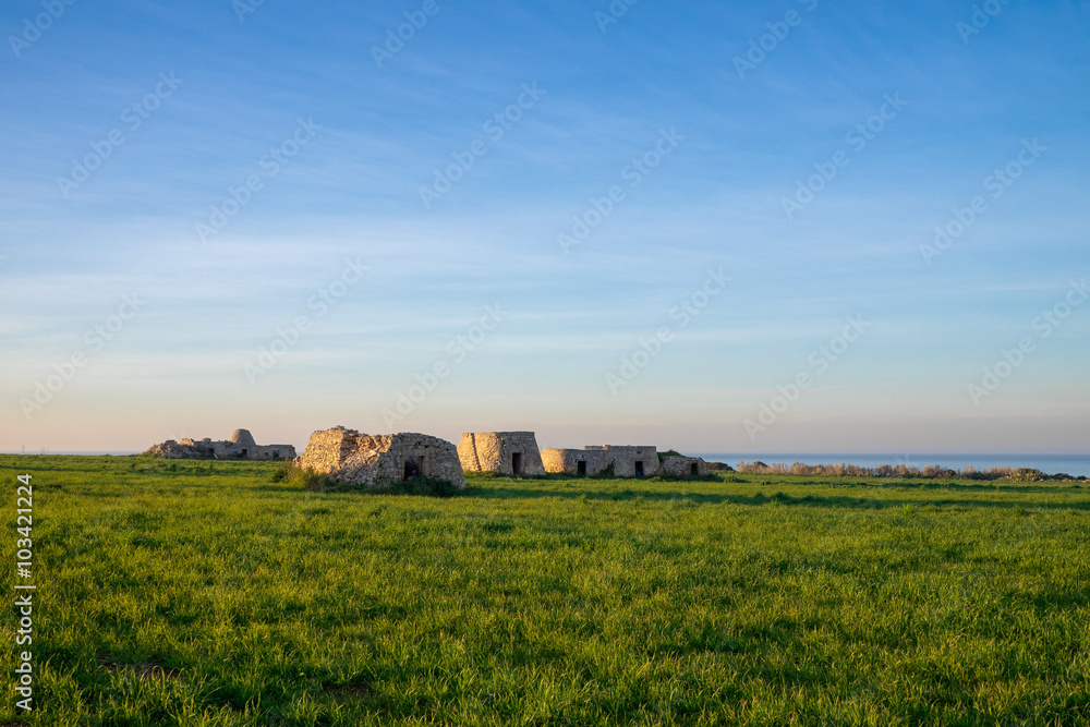 Countryside with trullo houses near Polignano a Mare. Apulia region, Italy. Countryside with trullo houses near Polignano a Mare. Apulia region, Italy.