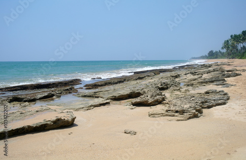 Stones on the idyllic beach in Sri Lanka. © ekulik2011