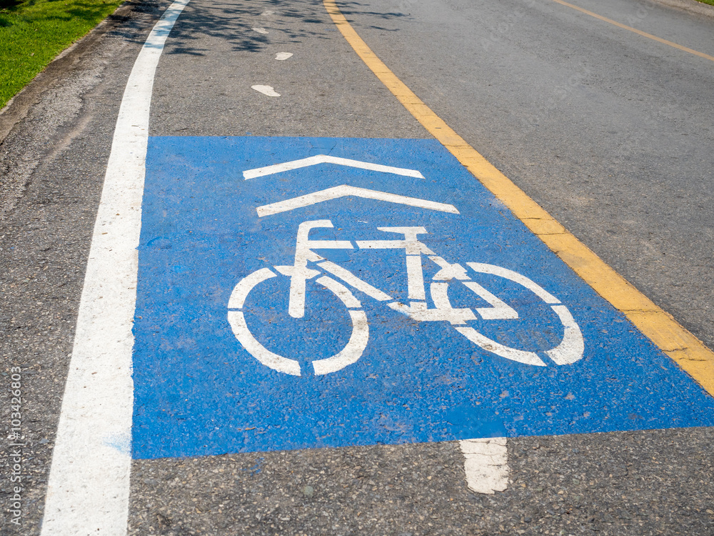 Obraz premium blue color painted on asphalt road