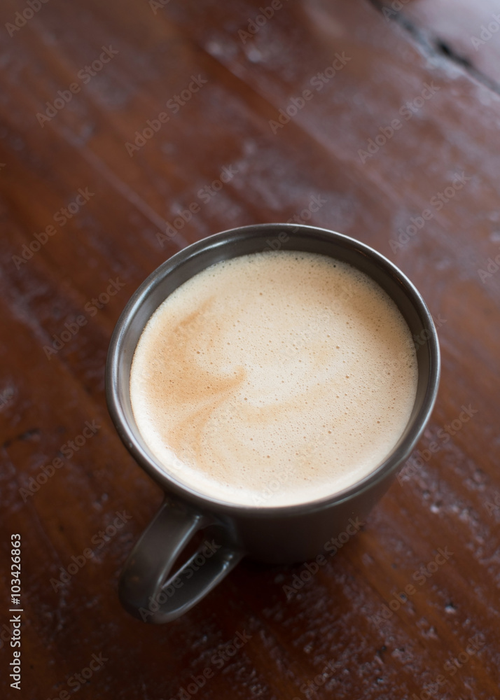 cup of coffee on table cup of coffee on table