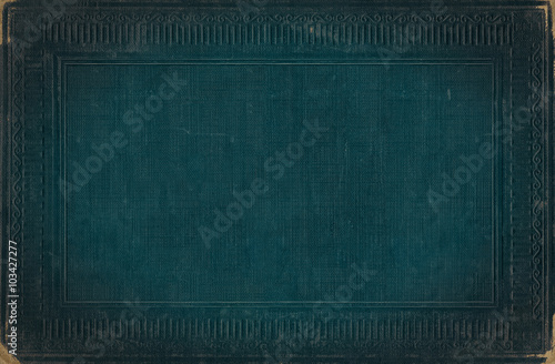 Turquoise blue vintage background from distress fabric texture with antique ornamental frame