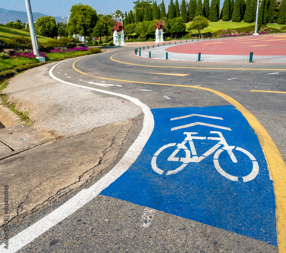 Obraz premium blue color painted on asphalt road