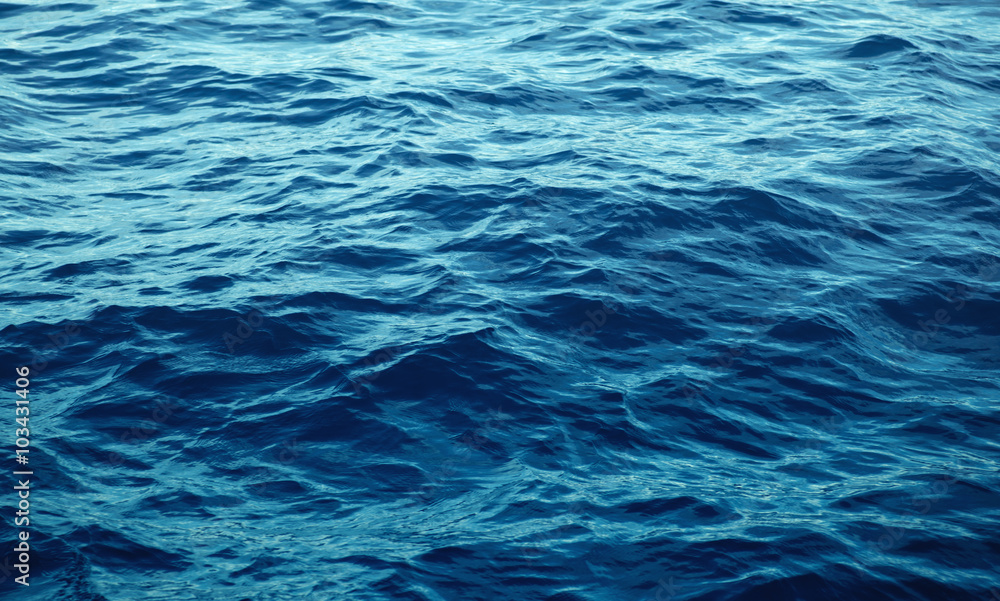 Naklejka premium Blue sea with waves close up