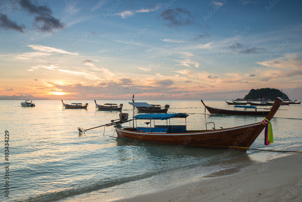 Long tail boats with sunrise sky in Koh Lipe Island