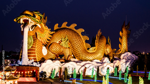 Big dragon statue at night , Supanburi , Thailand