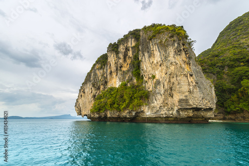 Thailand tropical island cliffs over ocean water during tourist boat trip in Railay Beach resort © softfocusphoto