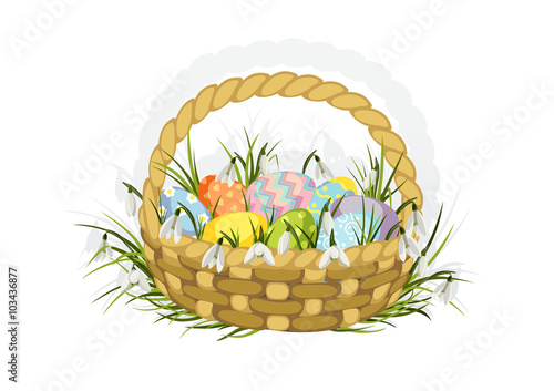 isolated easter basket with eggs and snowdrops