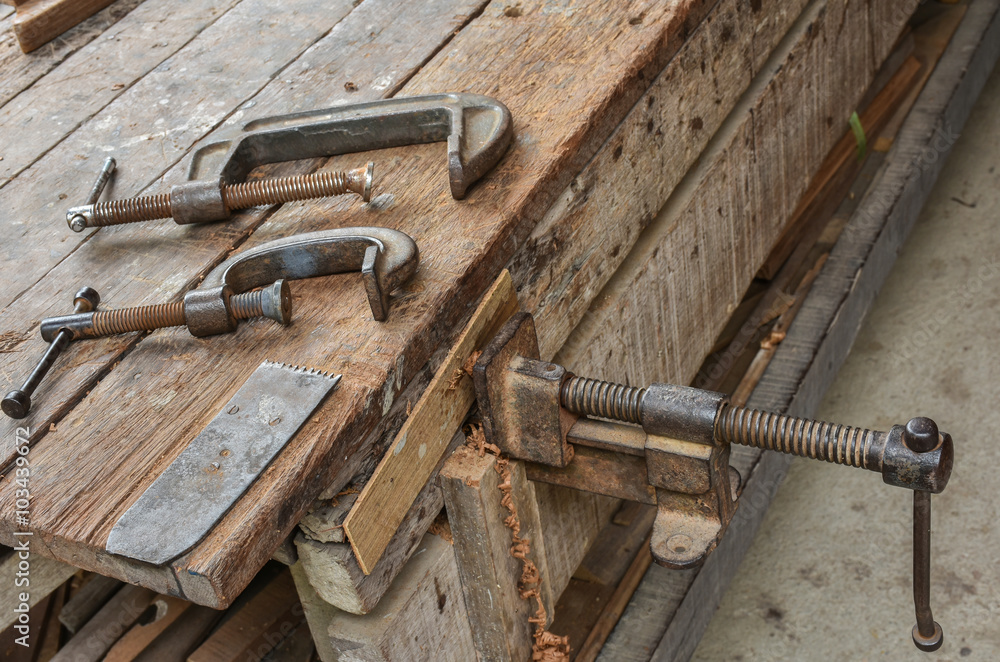 Clamps tool equipped at a carpenter's work bench
Clamps tool equipped at a carpenter's work bench