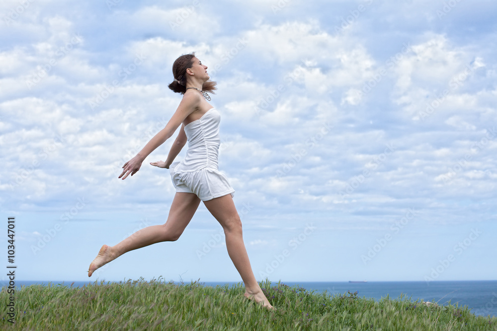 Girl in white on open air. Attractive young woman in white dress Girl in white on open air. Attractive young woman in white dress