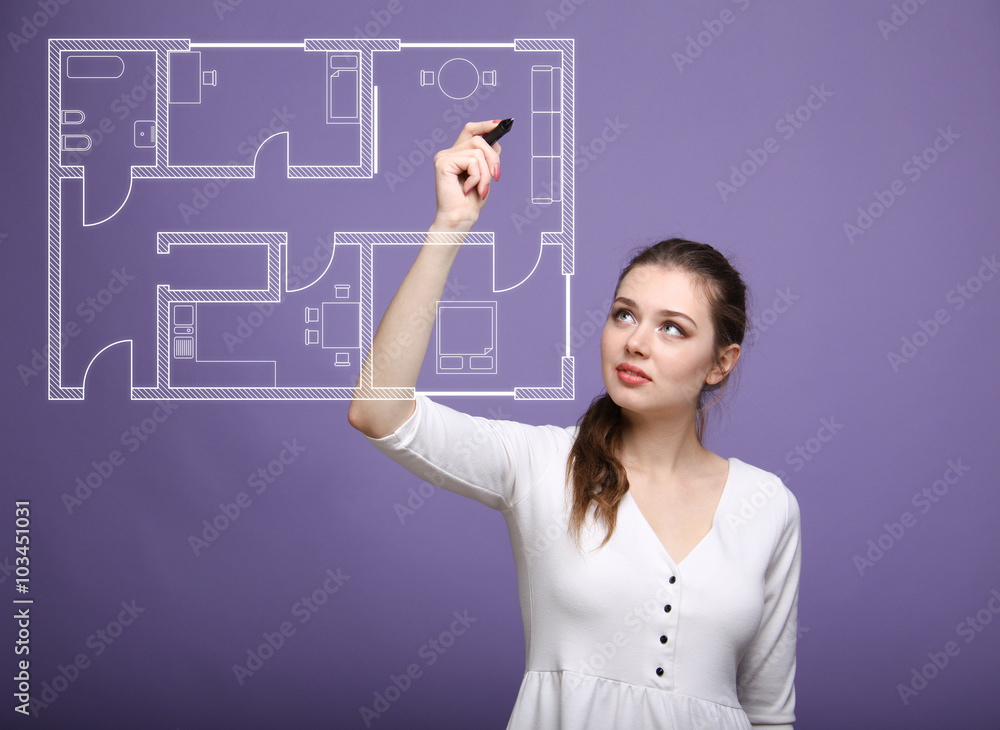 female architect working with a virtual apartment plan female architect working with a virtual apartment plan