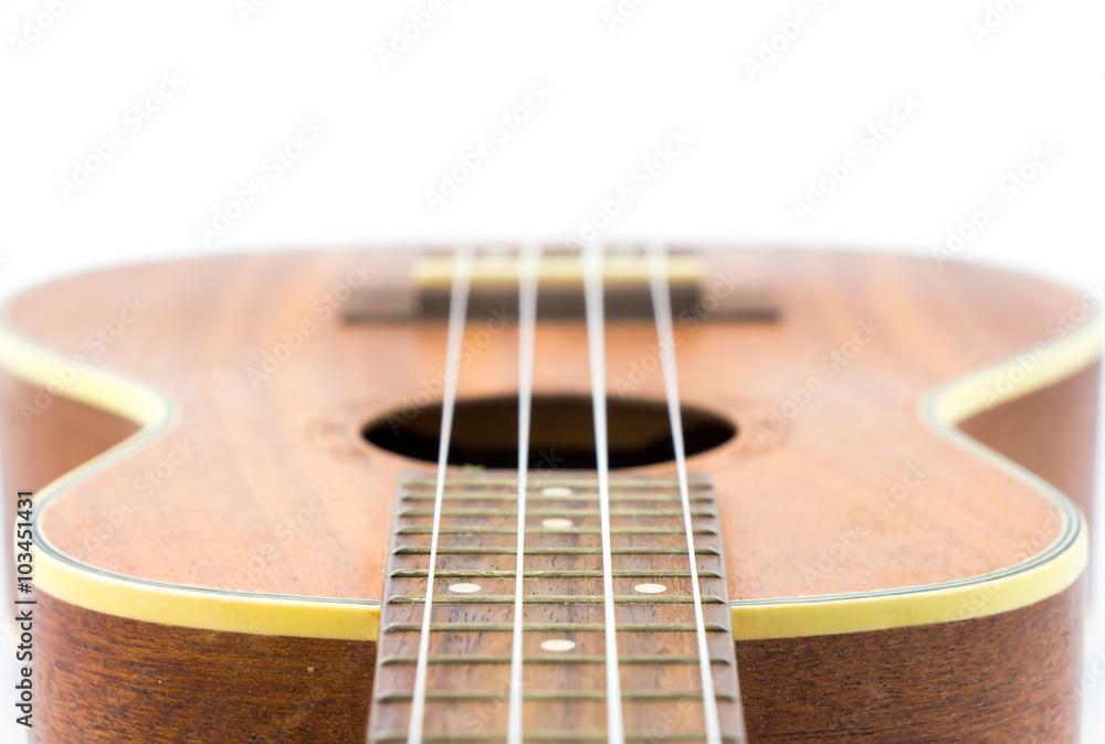 Fototapeta premium Part of brown ukulele isolate white background