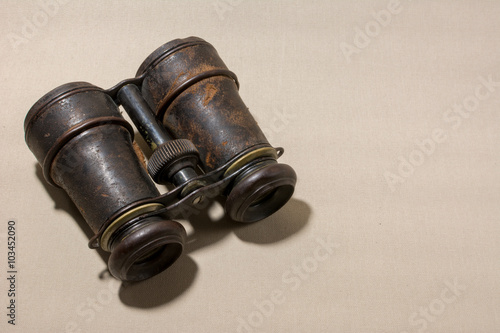 Antique leather binoculars (lying)