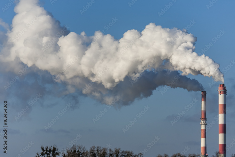 Big chimneys with dramatic clouds of smoke. Big chimneys with dramatic clouds of smoke.