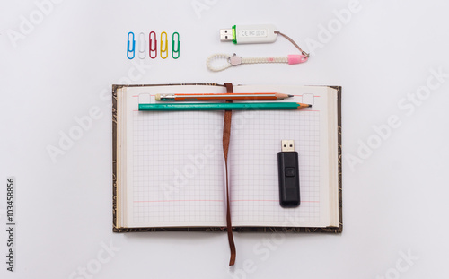 Wallpaper Mural set of storage - two pencils, notebook, flash drive on a white background Torontodigital.ca