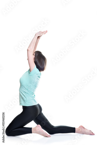 Fitness. She performs fitness exercise