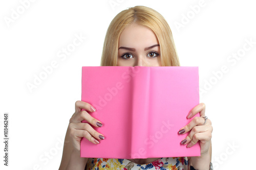 girl reading a book in red cover on white isolated background