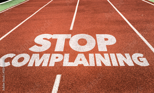 Stop Complaining written on running track