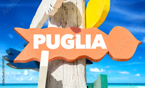 Puglia welcome sign with beach