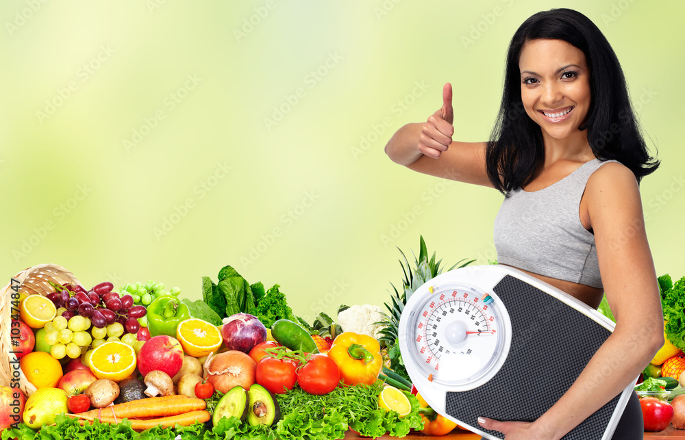Young woman with scales.