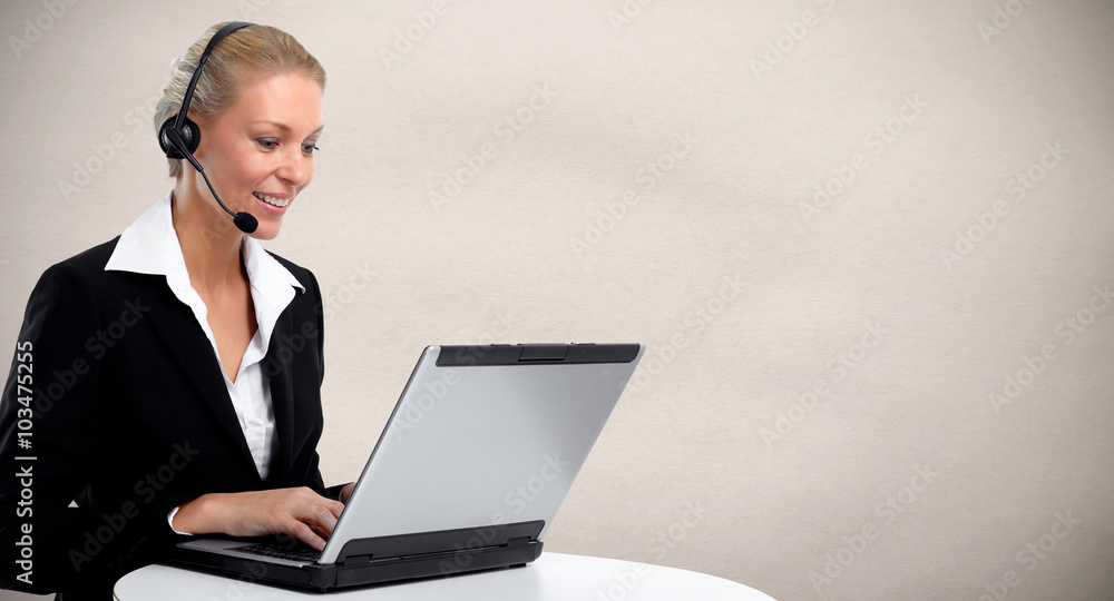Young business woman working with laptop. Young business woman working with laptop.
