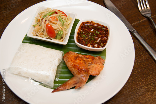  Green papaya salad, grilled chicken and sticky rice
