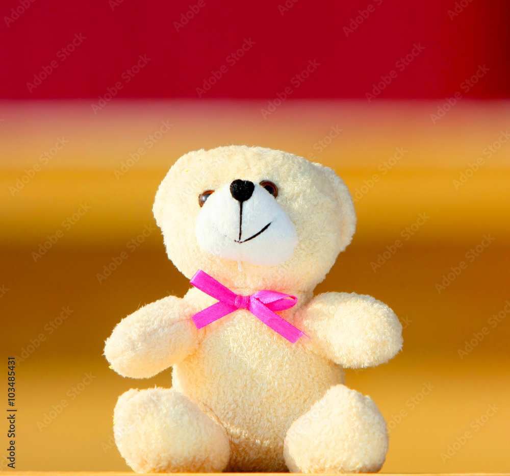 Soft toy closeup. Teddy bear toy. Cute toy with a pink bow. Beautiful and  good bear. Stock Photo | Adobe Stock
